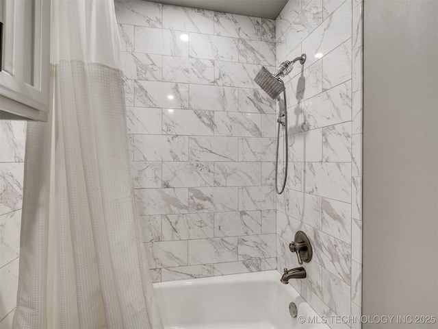 bathroom featuring shower / bathtub combination with curtain