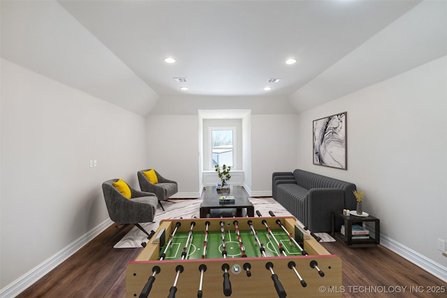 playroom featuring lofted ceiling, recessed lighting, dark wood-type flooring, visible vents, and baseboards