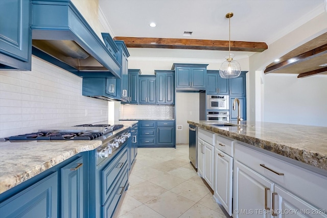 kitchen with blue cabinets, beam ceiling, hanging light fixtures, and light stone counters