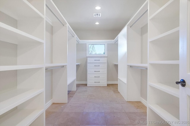 walk in closet with visible vents