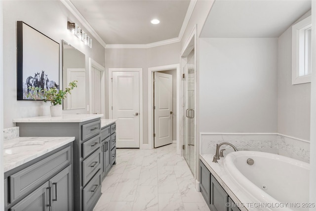 bathroom with a stall shower, ornamental molding, marble finish floor, a garden tub, and vanity