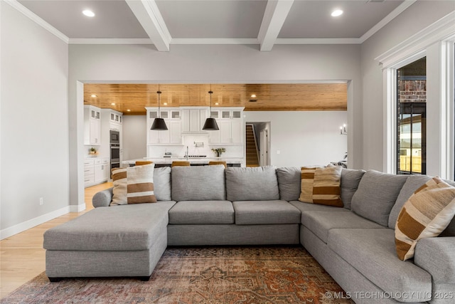 living room with dark wood-style floors, recessed lighting, beamed ceiling, and baseboards