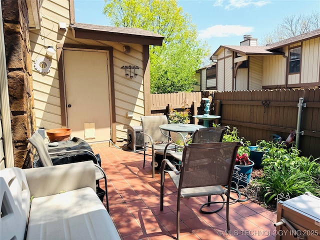 view of patio / terrace with fence