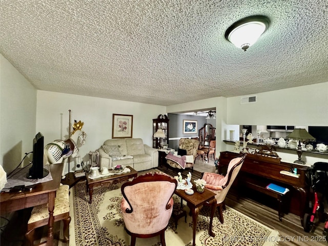 6371 S 80th E Ave Unit 6H, Tulsa, OK 74133 - office area with a textured ceiling and wood finished floors