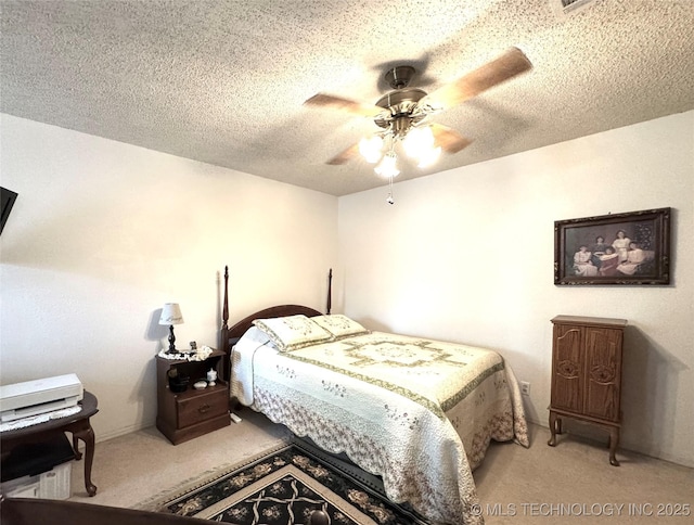 6371 S 80th E Ave Unit 6H, Tulsa, OK 74133 - carpeted bedroom with a textured ceiling and a ceiling fan