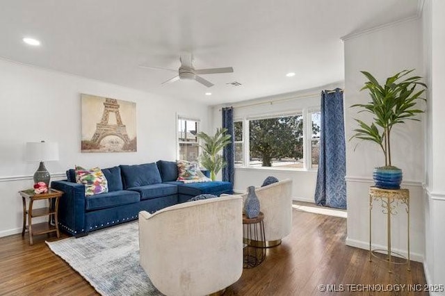 living area featuring ceiling fan, baseboards, wood finished floors, and recessed lighting