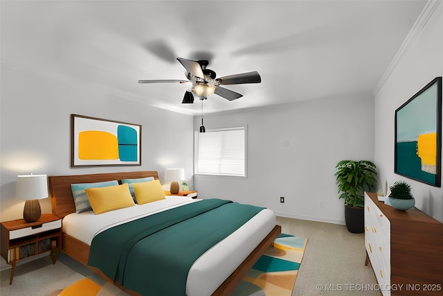 bedroom with ceiling fan, crown molding, baseboards, and light colored carpet