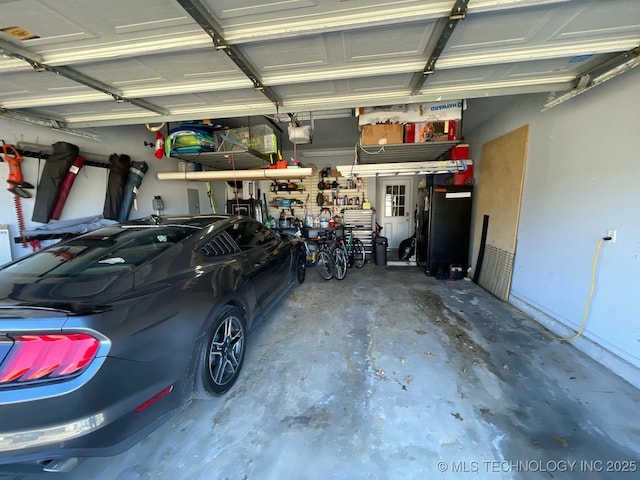 garage featuring a garage door opener