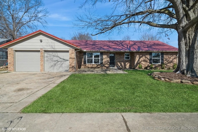 ranch-style home featuring a front yard, brick siding, driveway, and an attached garage