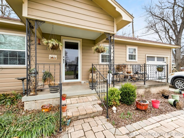 doorway to property featuring a porch