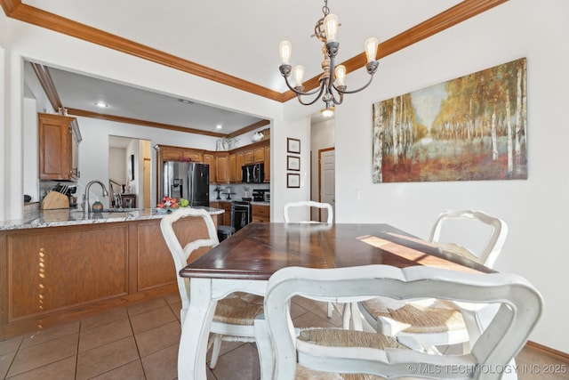 dining space with ornamental molding, light tile patterned flooring, and an inviting chandelier