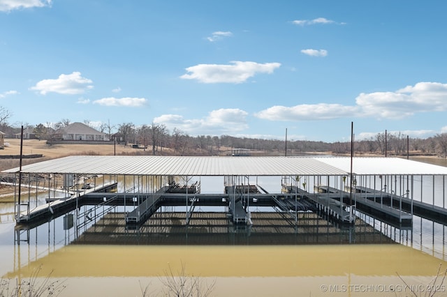 dock area featuring a water view and boat lift