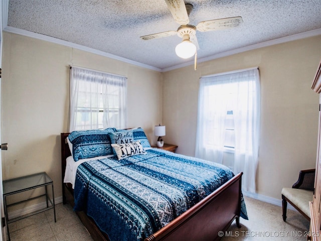 bedroom with multiple windows and crown molding