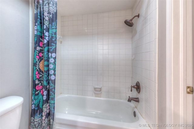 full bathroom with shower / bathtub combination with curtain and toilet