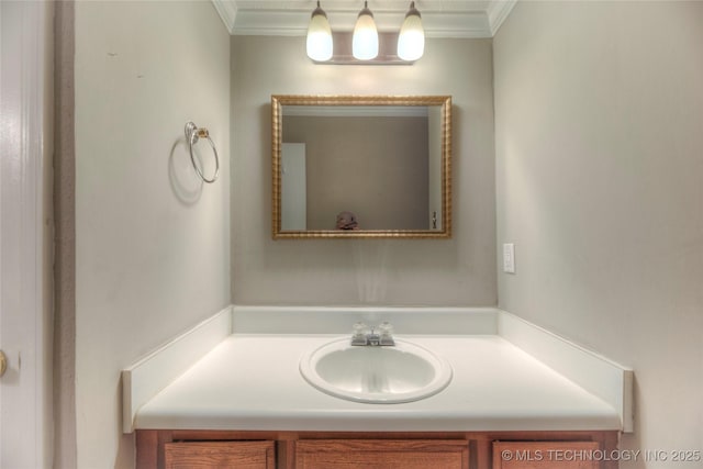 bathroom featuring vanity and crown molding