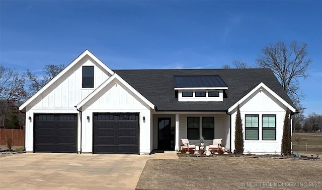 modern farmhouse featuring board and batten siding, roof with shingles, driveway, and a porch