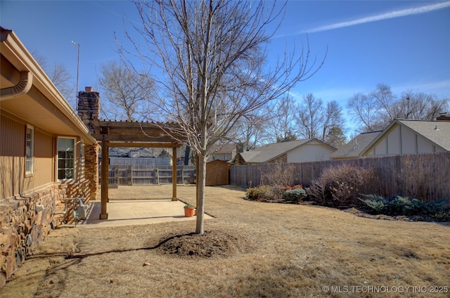 view of yard with a patio and a fenced backyard