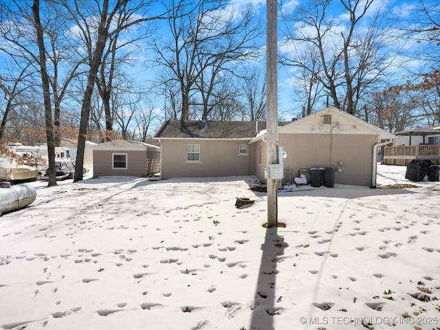 view of snow covered house