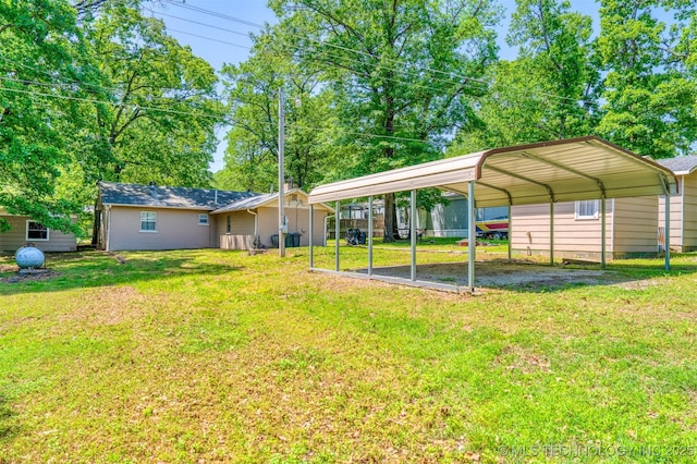 453576 Kaw Ave, Afton, OK 74331 - view of green lawn with driveway and a carport