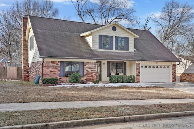 view of front of home featuring a garage, concrete driveway, roof with shingles, fence, and brick siding