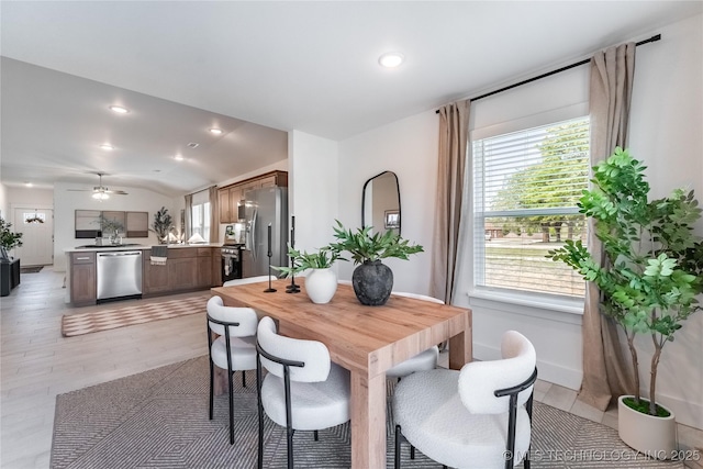 dining space with a wealth of natural light, ceiling fan, and recessed lighting