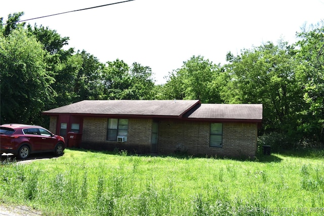 ranch-style house with brick siding