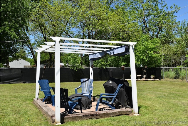 view of yard featuring a fenced backyard and a pergola