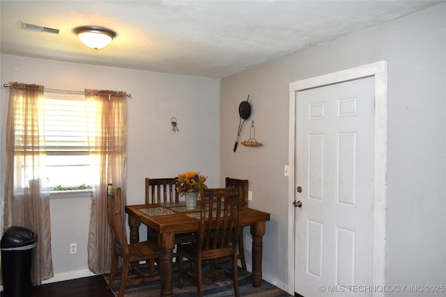 dining space with visible vents