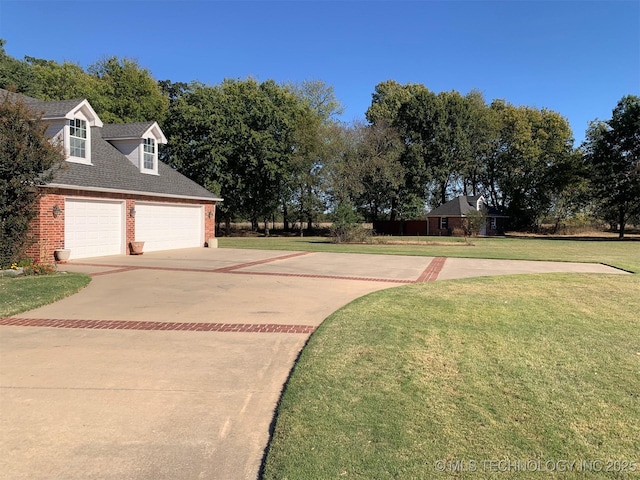 view of yard featuring a garage