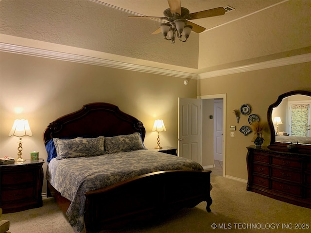 bedroom with baseboards, light colored carpet, ornamental molding, a tray ceiling, and vaulted ceiling