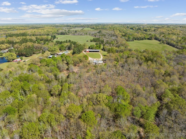 aerial view featuring a view of trees