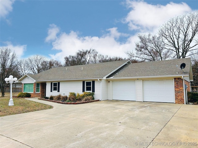 ranch-style house with a garage, concrete driveway, brick siding, and a shingled roof