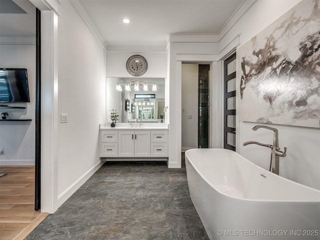 18420 E Persimmon Ln, Owasso, OK 74055 - full bath with ornamental molding, vanity, a soaking tub, and recessed lighting
