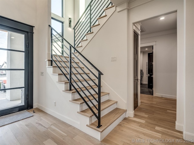 18420 E Persimmon Ln, Owasso, OK 74055 - staircase featuring wood finished floors, crown molding, and recessed lighting