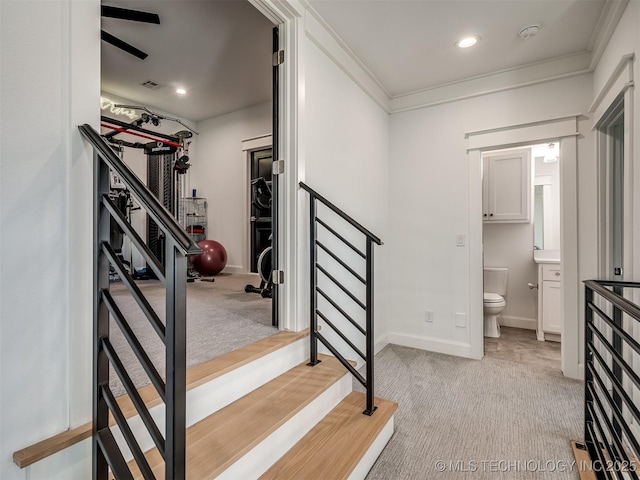 18420 E Persimmon Ln, Owasso, OK 74055 - staircase featuring carpet floors, ornamental molding, and recessed lighting