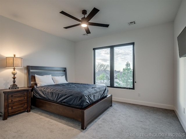 18420 E Persimmon Ln, Owasso, OK 74055 - bedroom with light carpet and ceiling fan