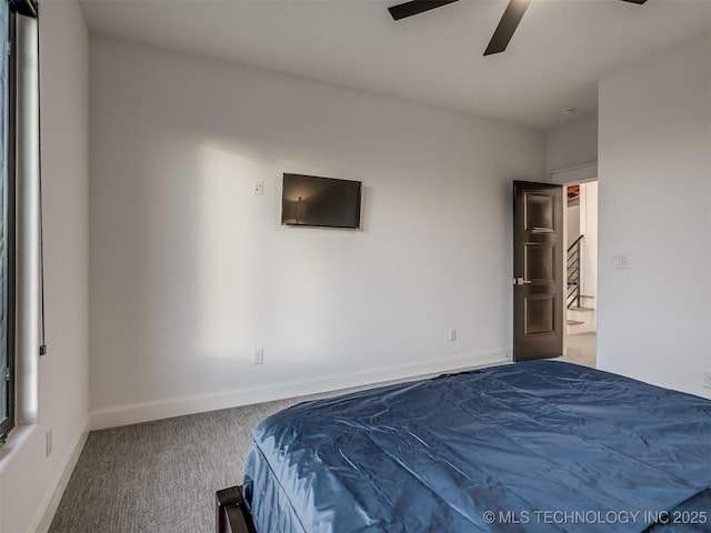 18420 E Persimmon Ln, Owasso, OK 74055 - bedroom with carpet floors and a ceiling fan