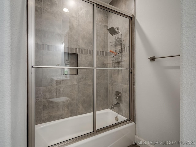 18420 E Persimmon Ln, Owasso, OK 74055 - bathroom featuring combined bath / shower with glass door