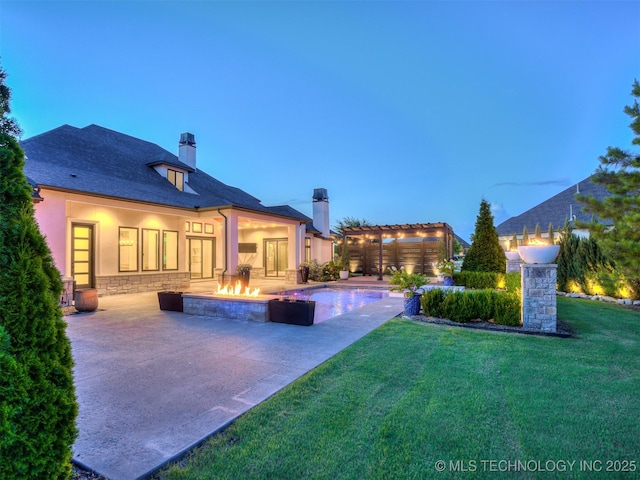 18420 E Persimmon Ln, Owasso, OK 74055 - back of house featuring a chimney, a patio area, a lawn, an outdoor pool, and a pergola