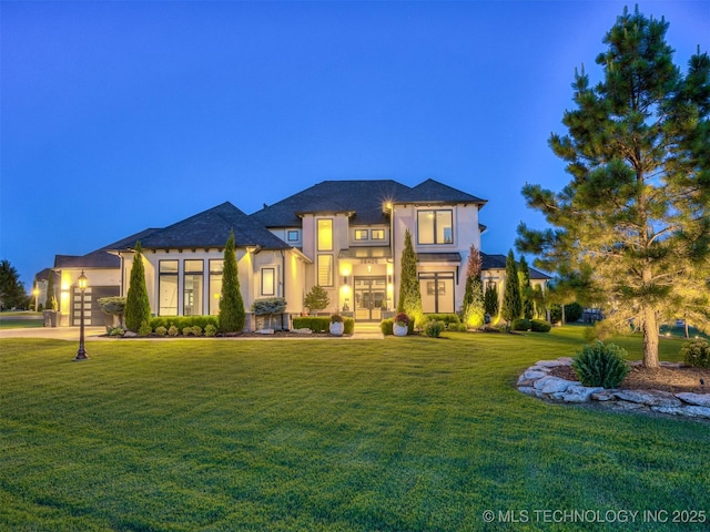 18420 E Persimmon Ln, Owasso, OK 74055 - prairie-style home featuring stucco siding, a front lawn, and a garage