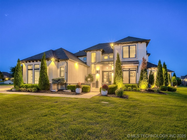 18420 E Persimmon Ln, Owasso, OK 74055 - view of front facade featuring stucco siding and a lawn