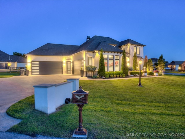 18420 E Persimmon Ln, Owasso, OK 74055 - view of front of property featuring concrete driveway, an attached garage, a front lawn, and stucco siding