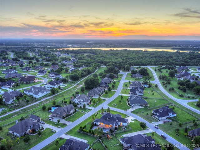 18420 E Persimmon Ln, Owasso, OK 74055 - aerial view at dusk of a residential view