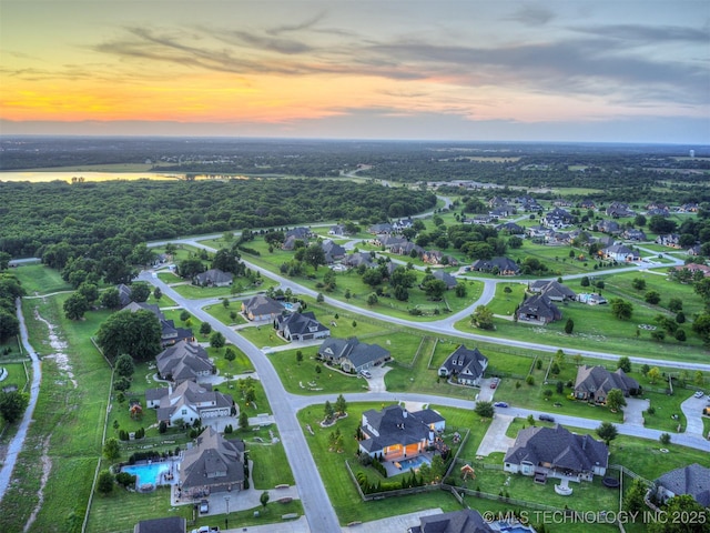 18420 E Persimmon Ln, Owasso, OK 74055 - aerial view at dusk of a residential view
