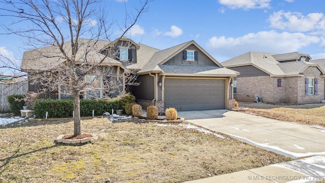 craftsman house with an attached garage, roof with shingles, concrete driveway, and brick siding