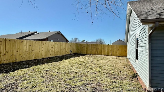 view of yard featuring a fenced backyard