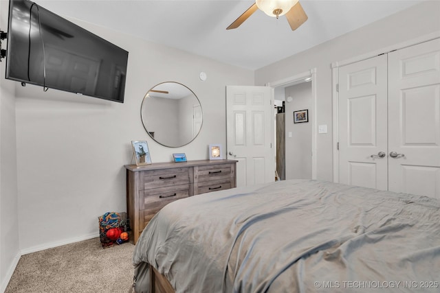 bedroom featuring a closet, carpet flooring, ceiling fan, and baseboards