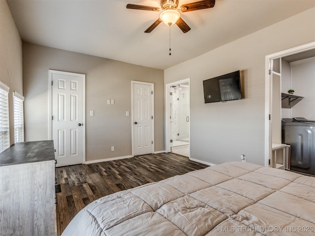13902 S 241st E Ave, Coweta, OK 74429 - bedroom with wood finished floors, baseboards, washer / clothes dryer, connected bathroom, and ceiling fan