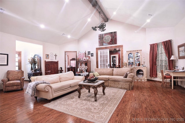 living room with beamed ceiling, dark wood-style flooring, high vaulted ceiling, and visible vents