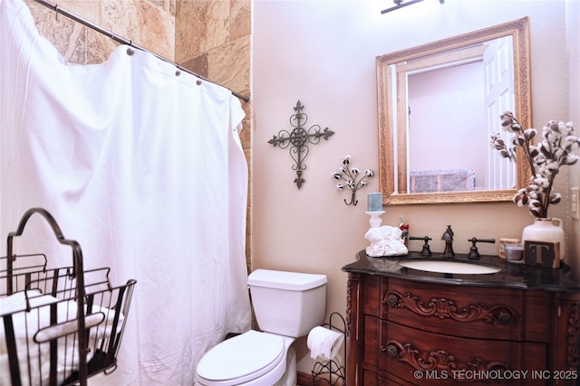 full bath with toilet, a shower with curtain, and vanity